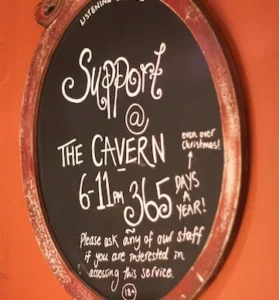 Support at the Cavern sign